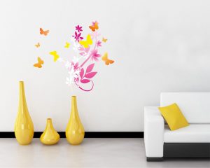 Adesivo murale-farfalle tra i fiori