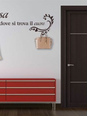 Adesivo murale frase "CASA È DOVE SI TROVA IL CUORE" - Appendiabiti design