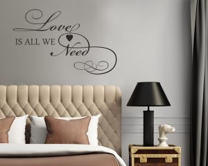 Adesivo murale-love is all we need