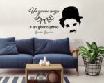 Adesivo da parete frase Charlie Chaplin "UN GIORNO SENZA SORRISO"