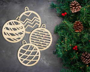 Set n.4 palline di Natale in legno "MOTIVI GEOMETRICI" - Decorazioni laser legno